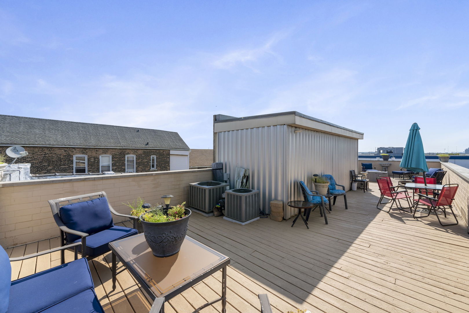 Undisclosed Address Chicago, IL 60608 - Photo 45 of 46 a view of a dining tables and chairs in the patio along the house