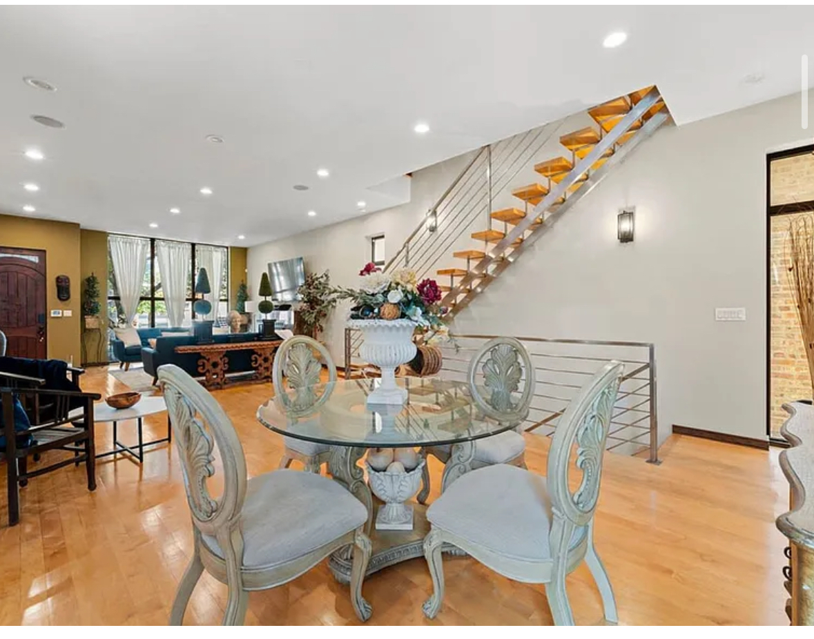 Undisclosed Address Chicago, IL 60608 - Photo 6 of 46 a dining room with furniture and wooden floor