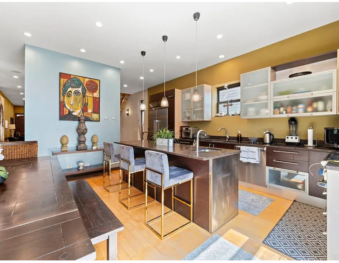 Undisclosed Address Chicago, IL 60608 - Photo 10 of 46 a dinning room and kitchen with a large window