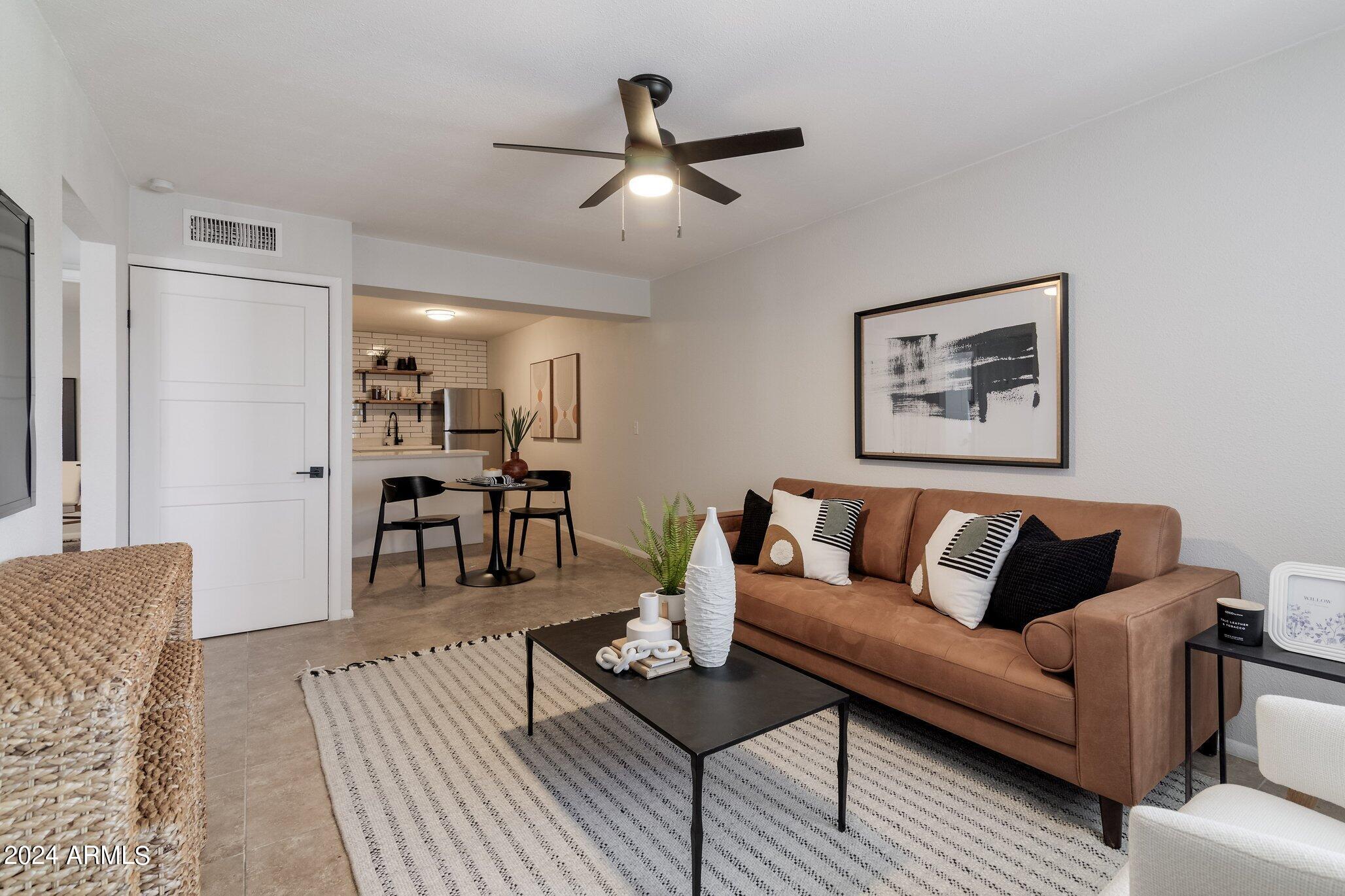1615 North 51st Street, Unit 5 Phoenix, AZ 85008 - Photo 4 of 18 a living room with furniture