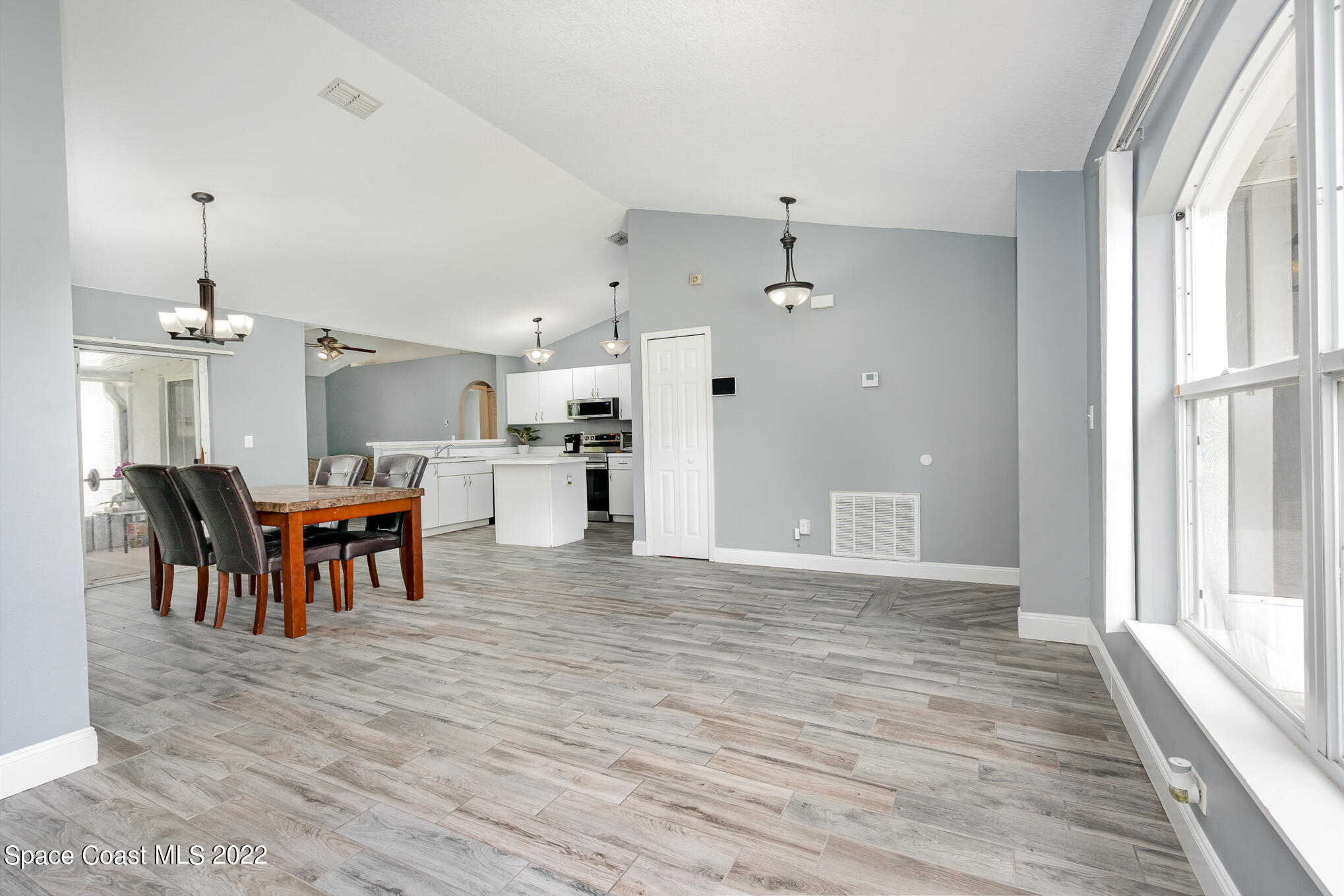 1290 Daton Road Southwest Palm Bay, FL 32908 - Photo 14 of 29 a view of a kitchen and dining room
