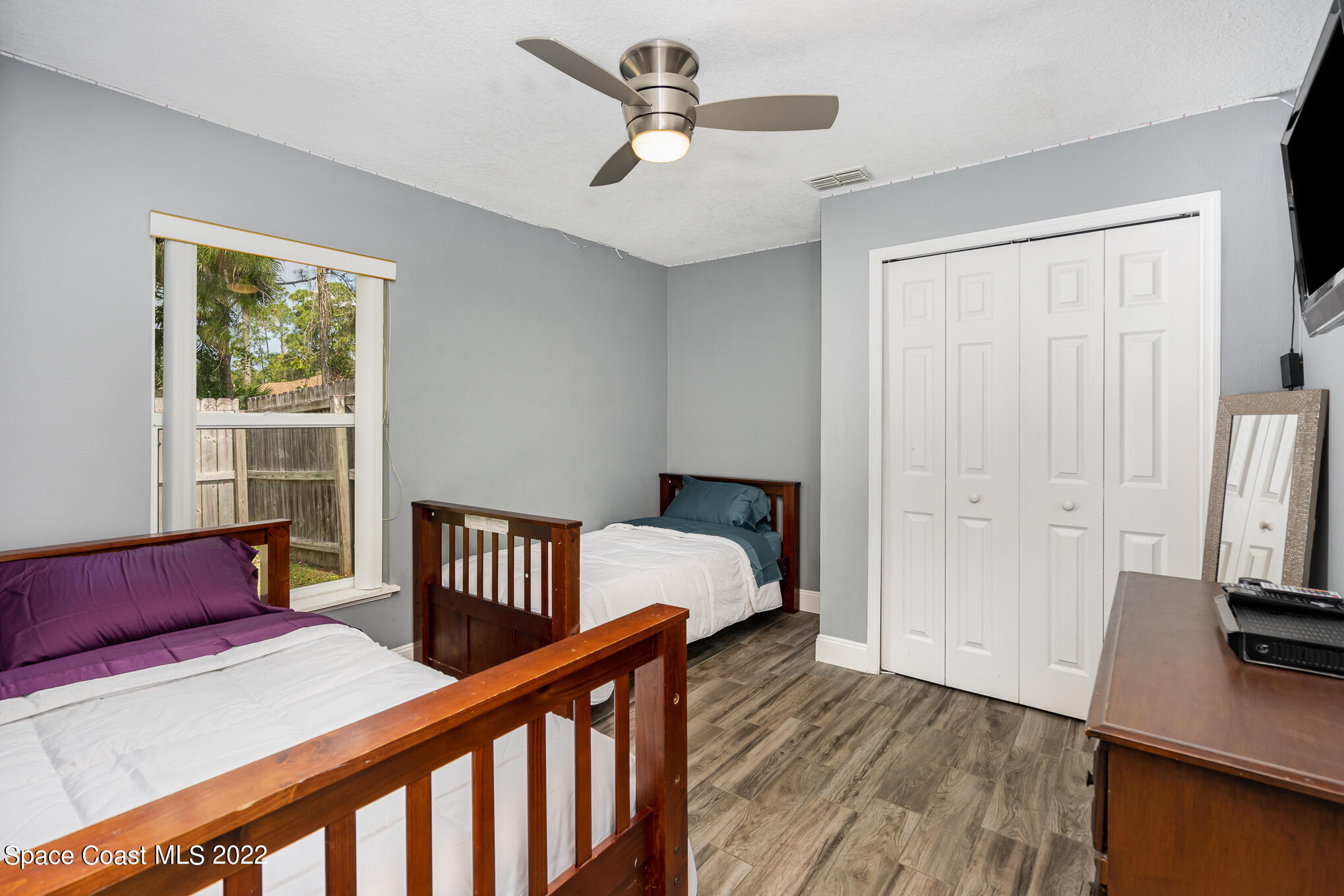 1290 Daton Road Southwest Palm Bay, FL 32908 - Photo 23 of 29 a bedroom with furniture and a window