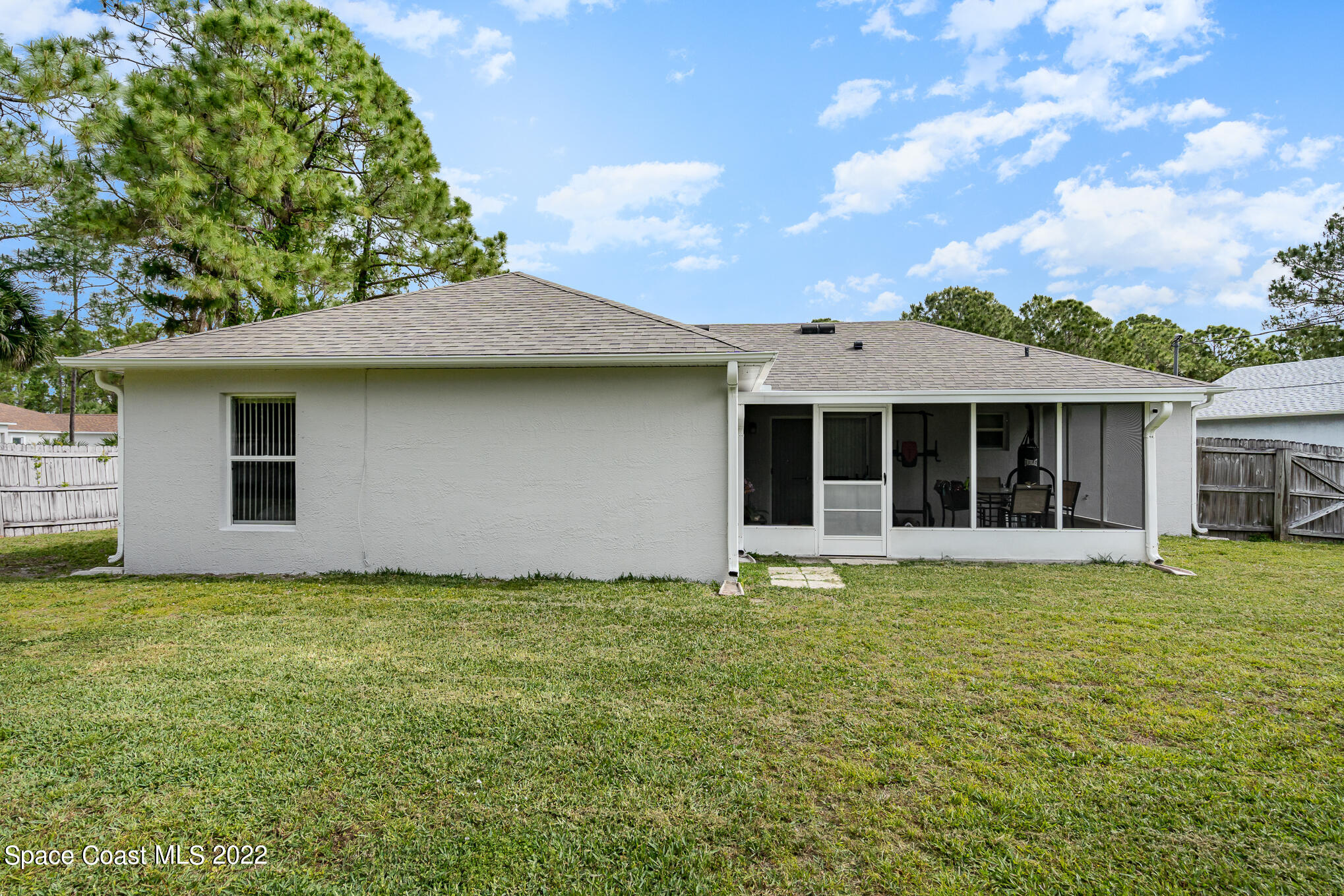 1290 Daton Road Southwest Palm Bay, FL 32908 - Photo 9 of 29 a view of a house with a garden