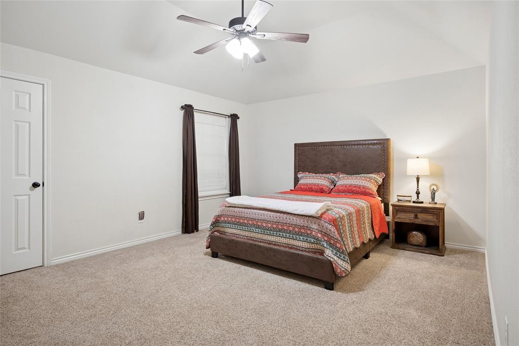 199 Newfield Lane Springtown, TX 76082 - Photo 23 of 38 Room featuring carpeted flooring and a ceiling fan