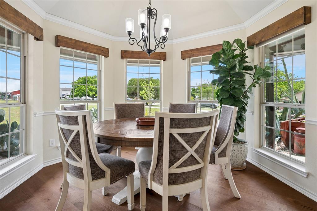 199 Newfield Lane Springtown, TX 76082 - Photo 8 of 38 A beautiful round dining room with surround windows to bring in the light