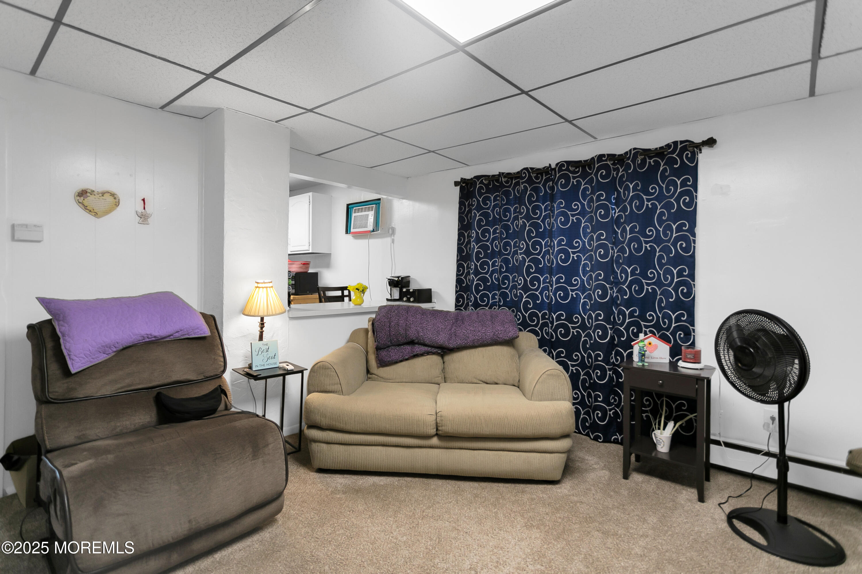 289 Port Monmouth Road North Middletown, NJ 07748 - Photo 13 of 37 a living room with furniture and a fireplace