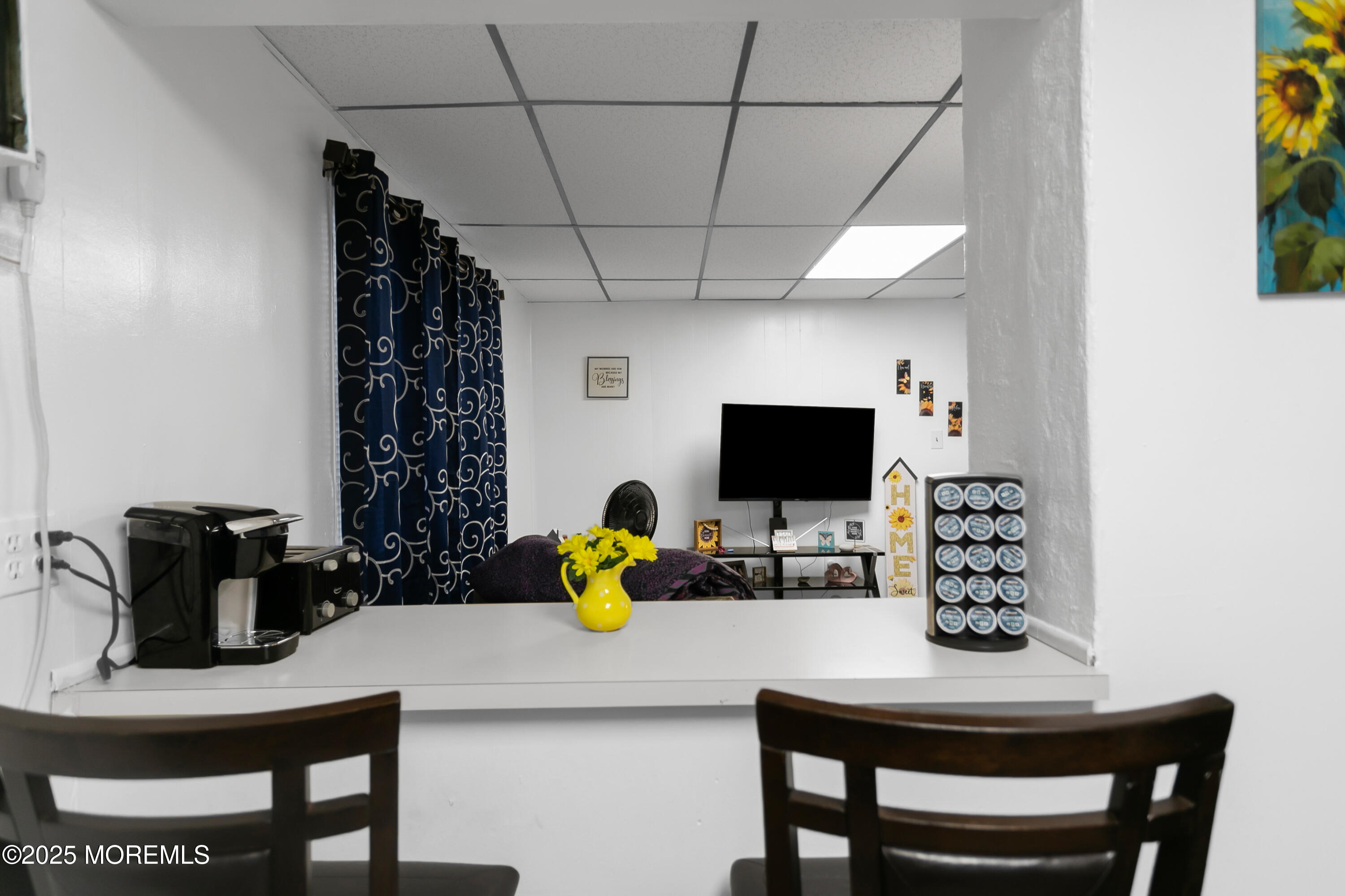 289 Port Monmouth Road North Middletown, NJ 07748 - Photo 16 of 37 a desk with a chair a lamp and a flat screen computer