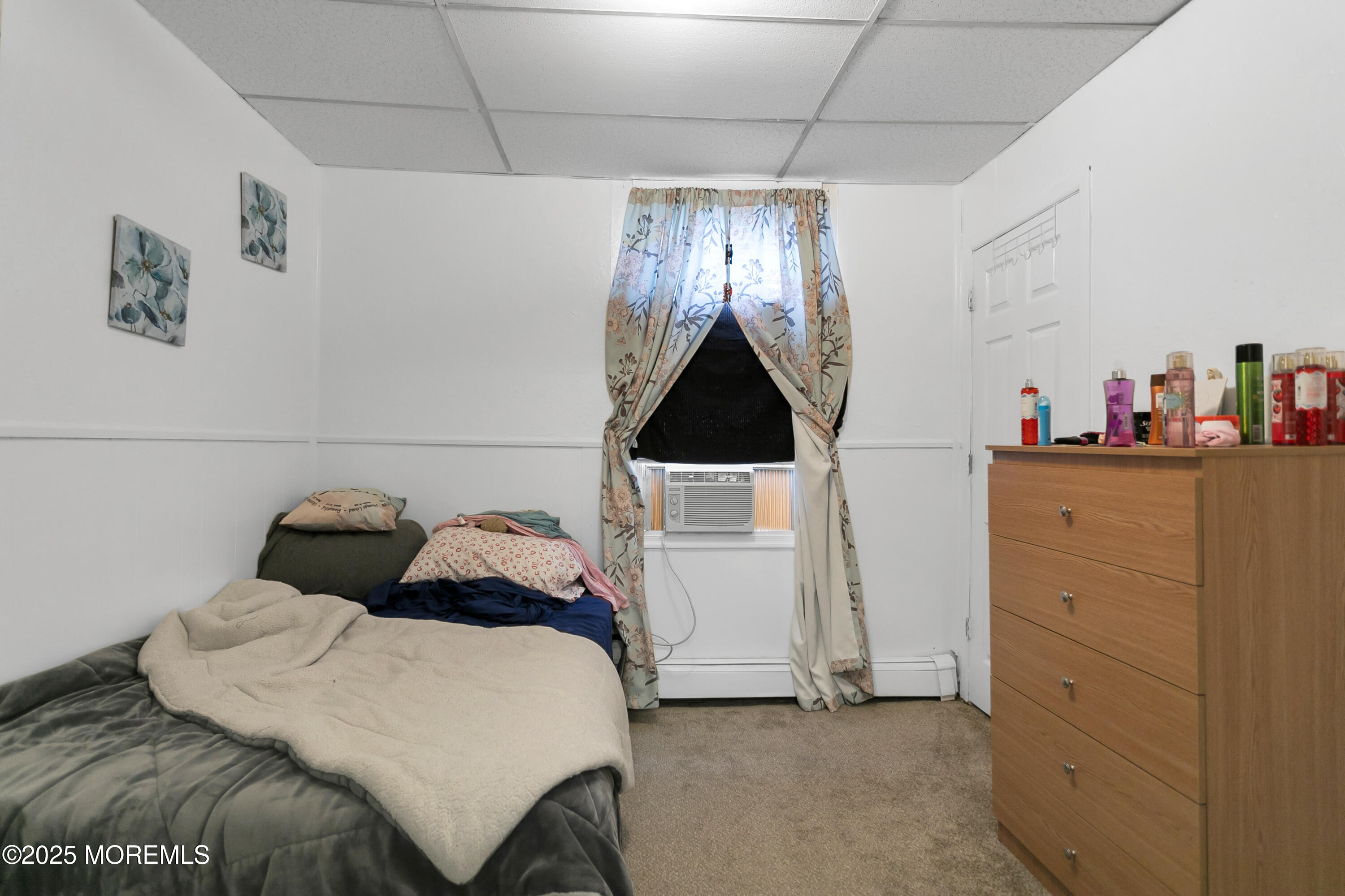 289 Port Monmouth Road North Middletown, NJ 07748 - Photo 18 of 37 a bedroom with a bed and a closet