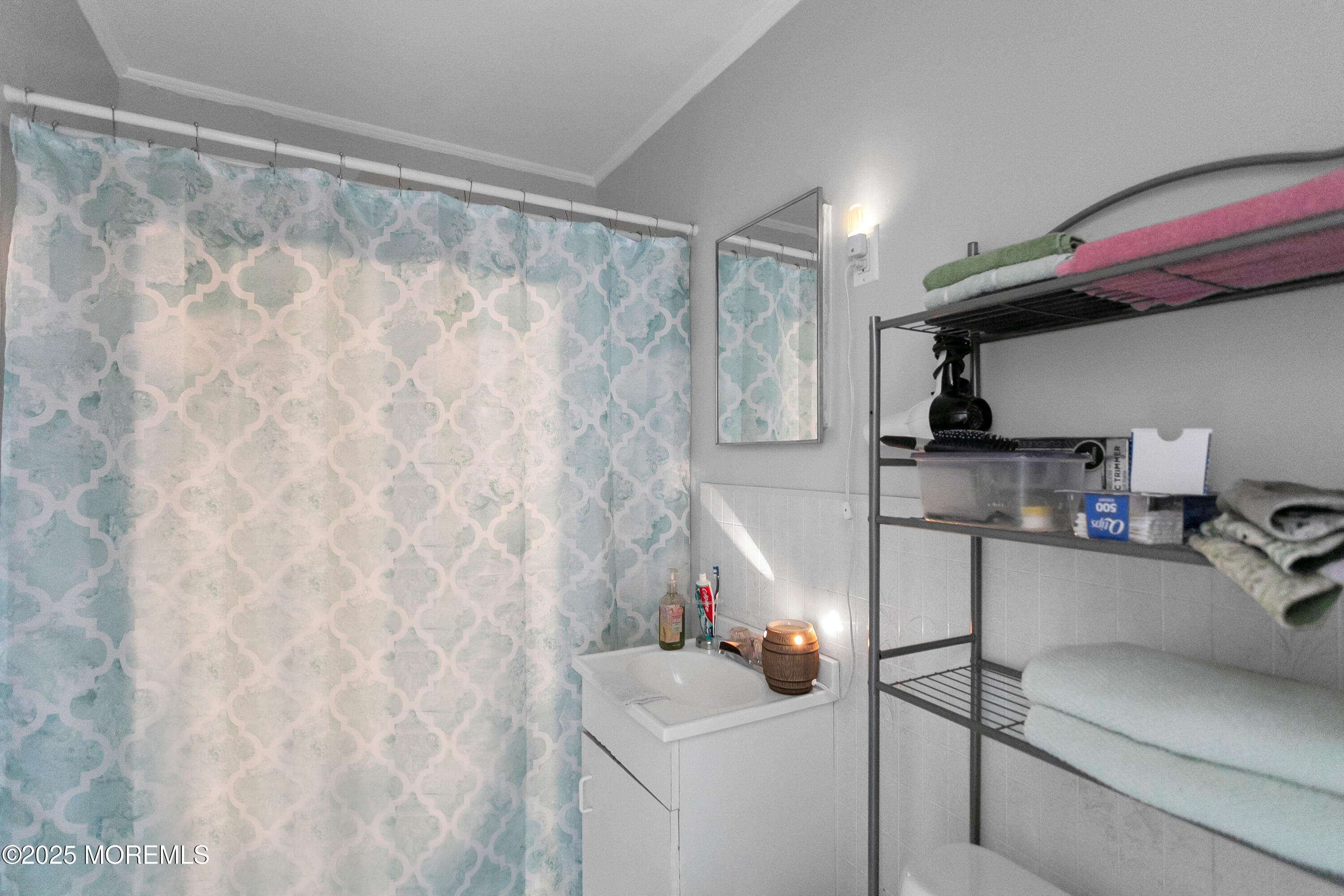 289 Port Monmouth Road North Middletown, NJ 07748 - Photo 31 of 37 a room with storage and utility