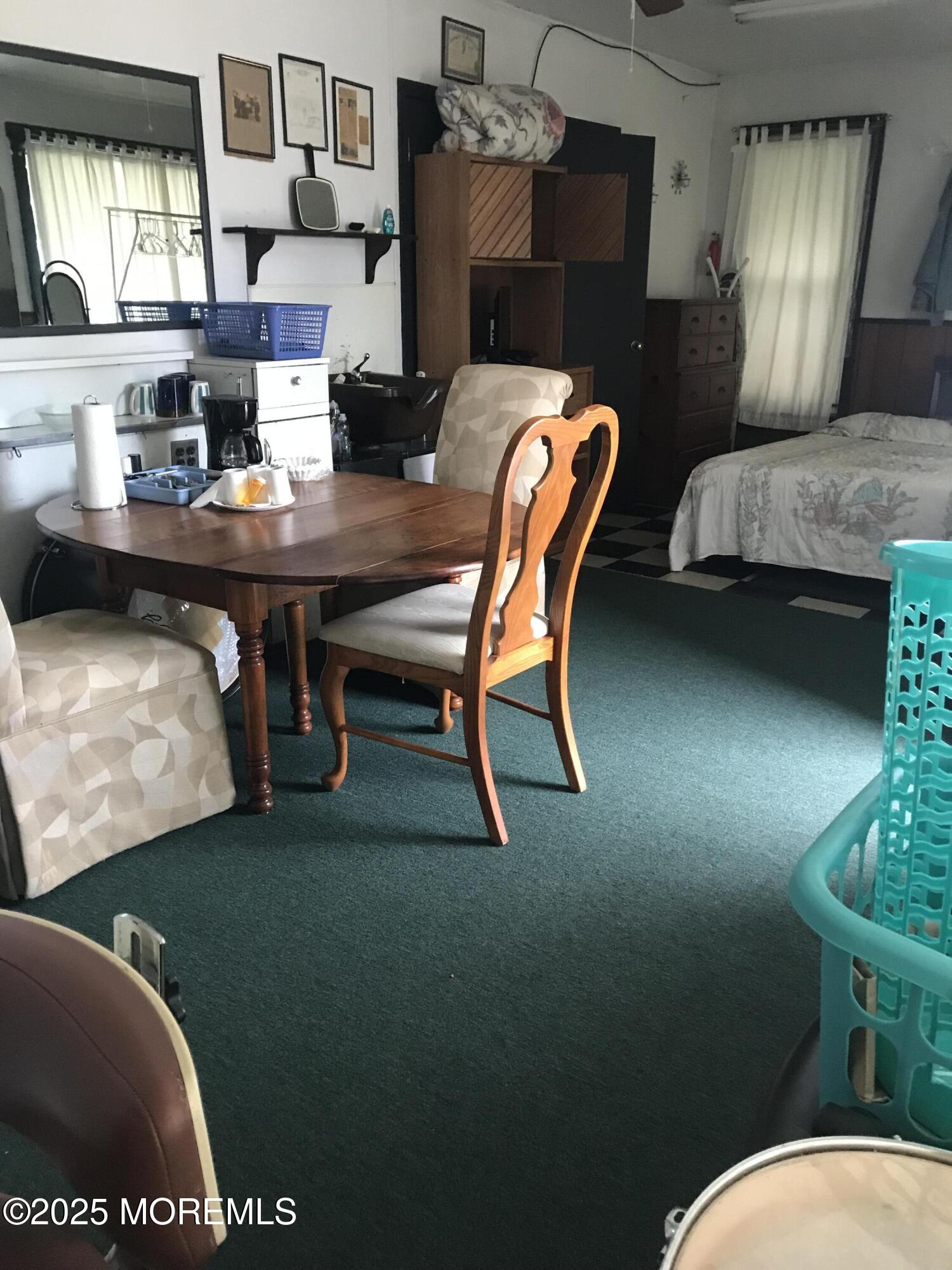 289 Port Monmouth Road North Middletown, NJ 07748 - Photo 4 of 37 a living room with furniture and a table