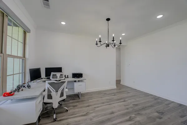 a view of livingroom with furniture and wooden floor