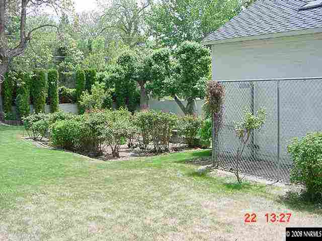 205 Urban Road Reno, NV 89509 - Photo 9 of 9 a view of a garden with a bench