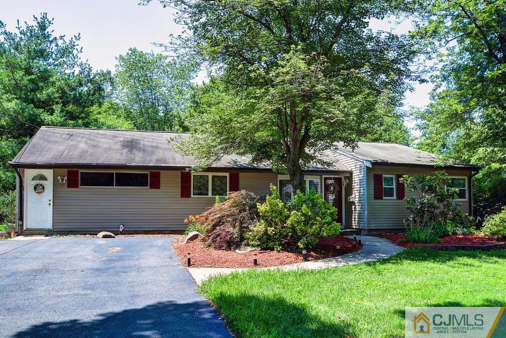 85 Kendall Road Kendall Park, NJ 08824 - Photo 3 of 25 front view of a house with a yard