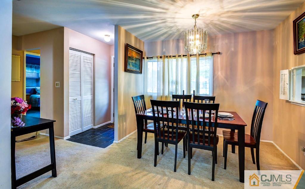 85 Kendall Road Kendall Park, NJ 08824 - Photo 7 of 25 a dining room with furniture and window