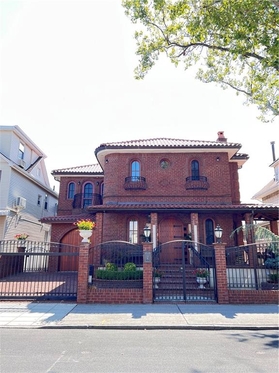 1406 73rd Street Brooklyn, NY 11228 - Photo 1 of 42 front view of a building with a pathway