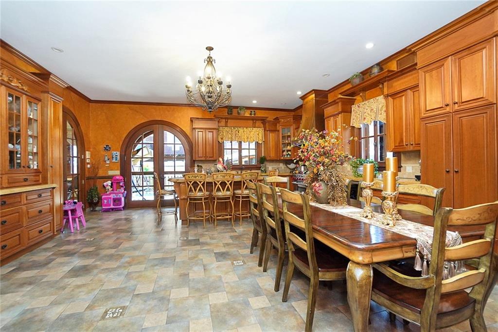 1406 73rd Street Brooklyn, NY 11228 - Photo 15 of 42 a view of a dining room with furniture