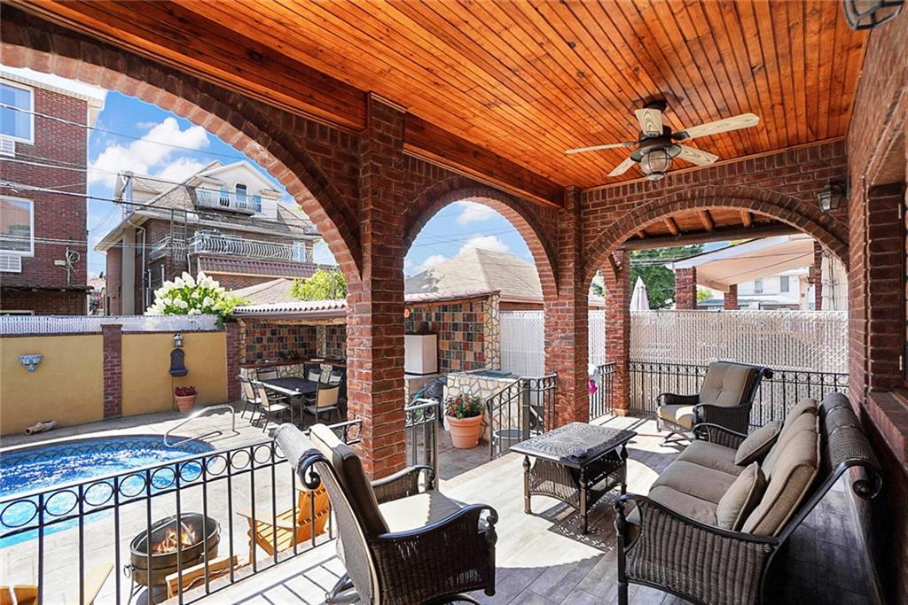 1406 73rd Street Brooklyn, NY 11228 - Photo 8 of 42 a building outdoor space with patio furniture
