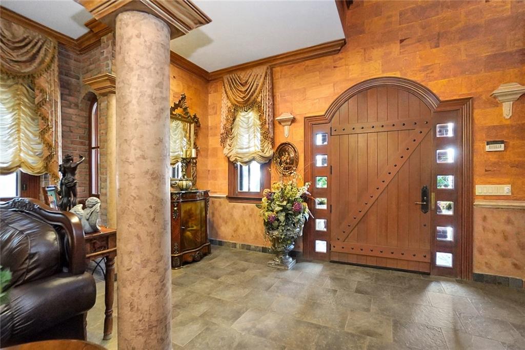 1406 73rd Street Brooklyn, NY 11228 - Photo 9 of 42 a view of an entryway with a door