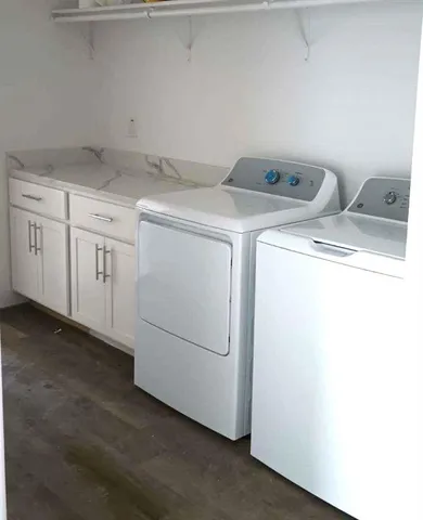 a utility room with dryer and washer