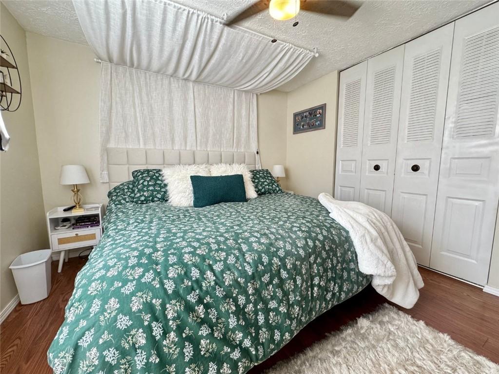 142 Partridge Run Road Gibsonia, PA 15044 - Photo 19 of 32 a bedroom with a large bed and a chandelier