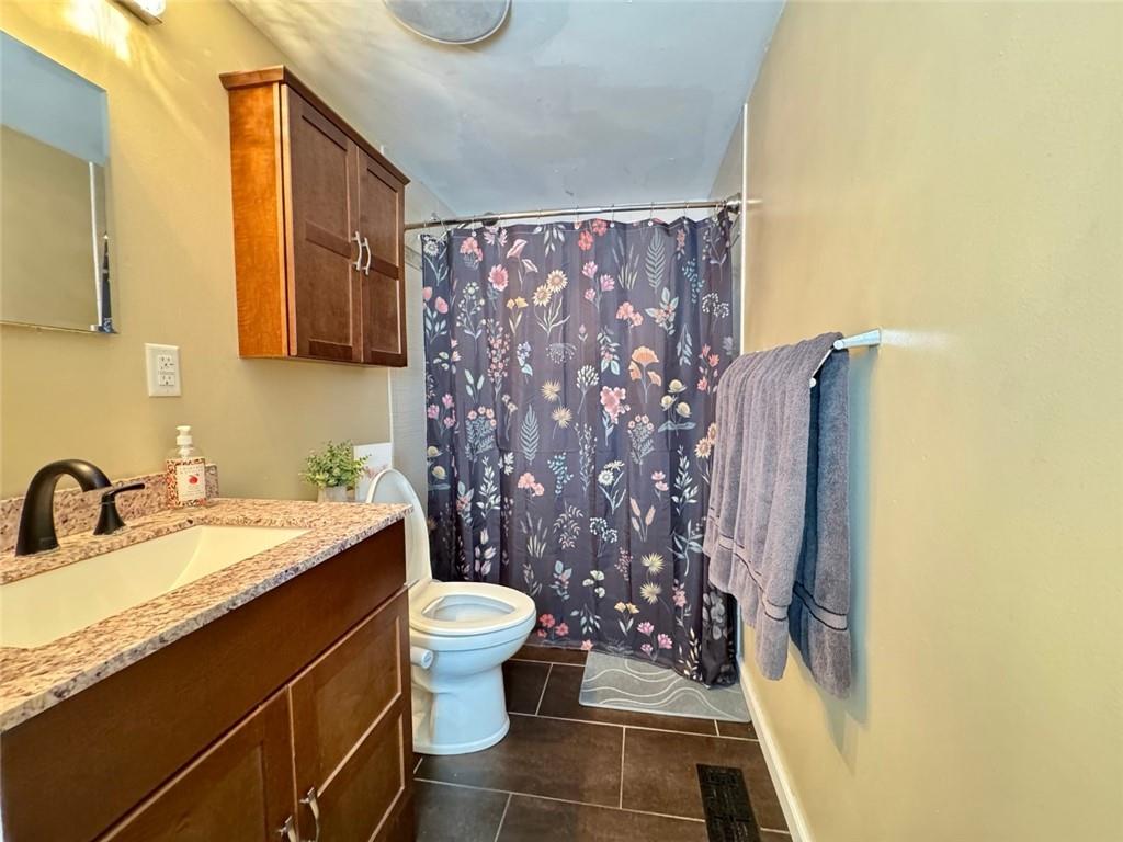 142 Partridge Run Road Gibsonia, PA 15044 - Photo 21 of 32 a bathroom with a sink and toilet