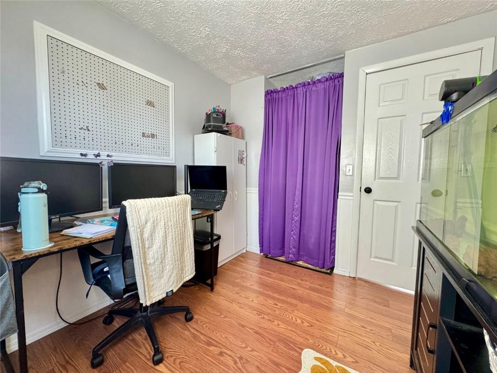142 Partridge Run Road Gibsonia, PA 15044 - Photo 25 of 32 a view of a workspace with furniture and wooden floor
