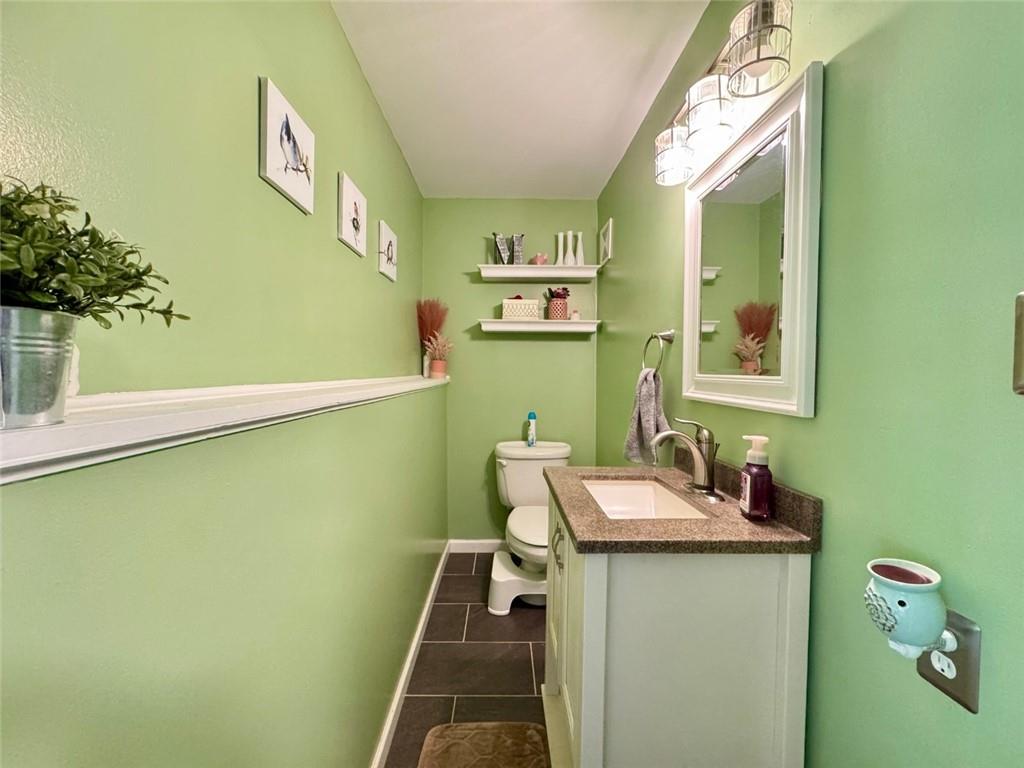 142 Partridge Run Road Gibsonia, PA 15044 - Photo 26 of 32 a bathroom with a sink and a mirror