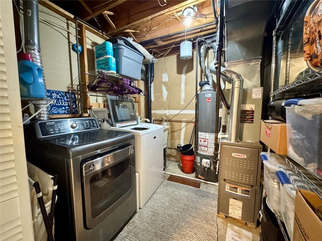 142 Partridge Run Road Gibsonia, PA 15044 - Photo 31 of 32 a utility room with dryer and washer