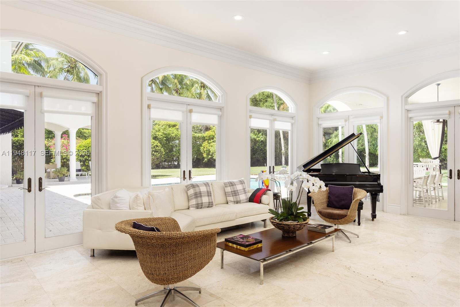 8252 School House Road Miami, FL 33143 - Photo 14 of 43 a living room with furniture and a large window