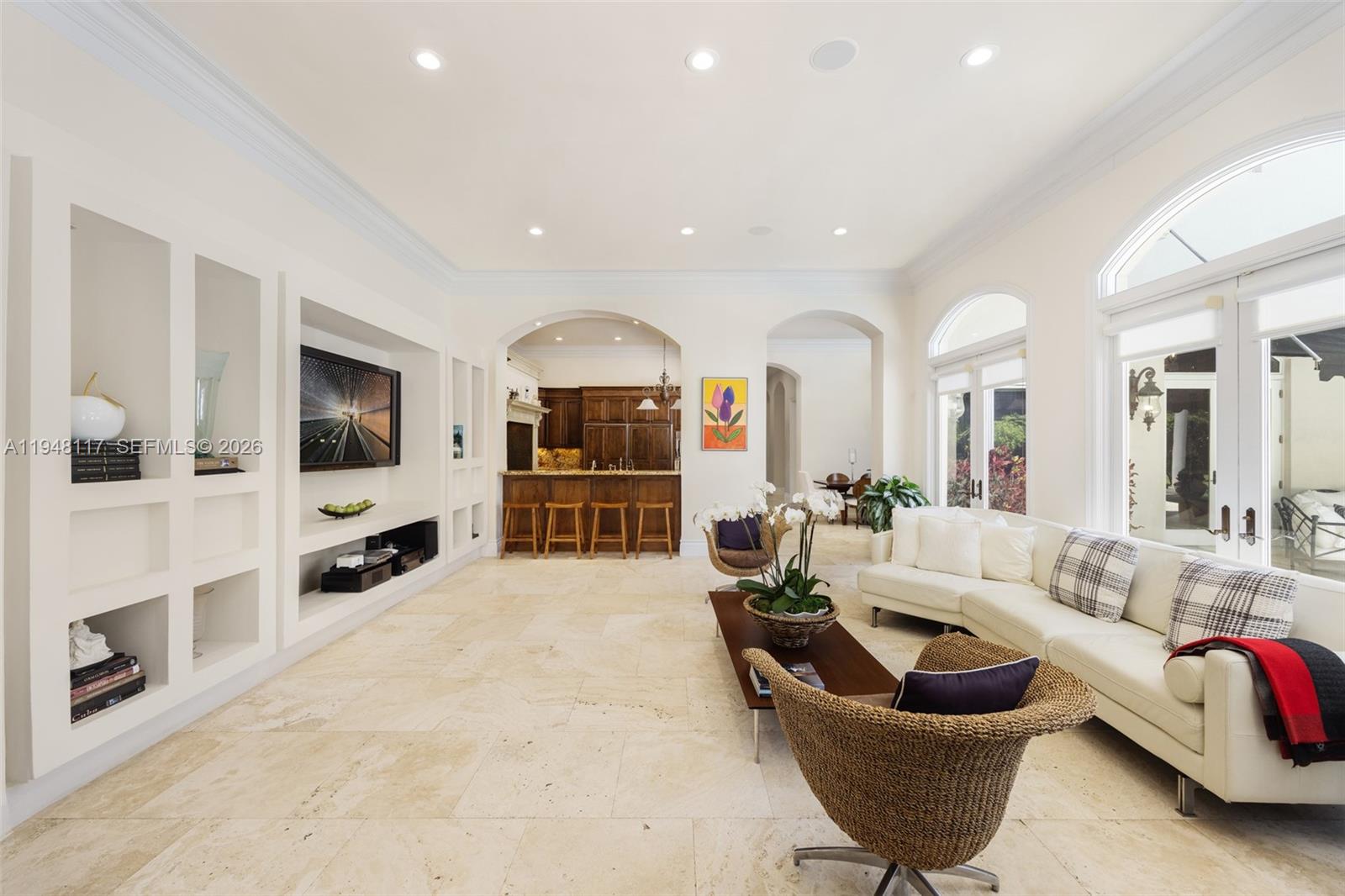 8252 School House Road Miami, FL 33143 - Photo 15 of 43 a living room with furniture and a flat screen tv