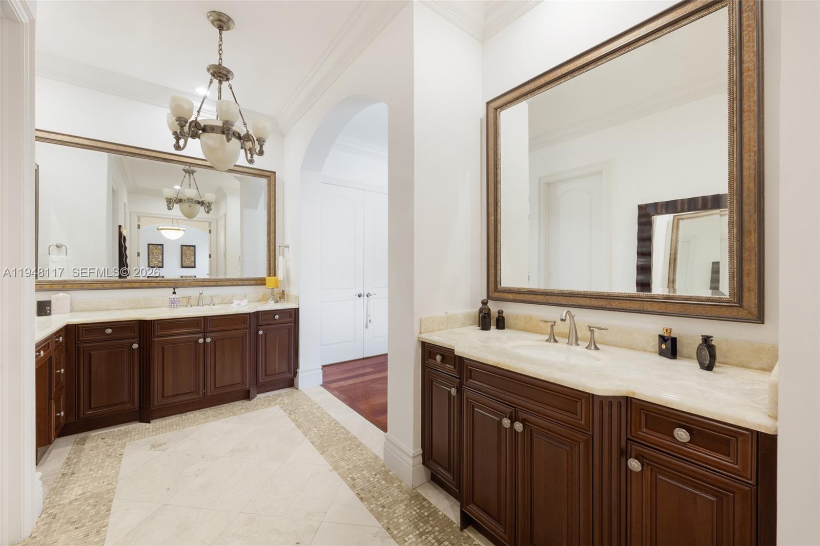 8252 School House Road Miami, FL 33143 - Photo 20 of 43 a spacious bathroom with a granite countertop sink mirror and a bathtub