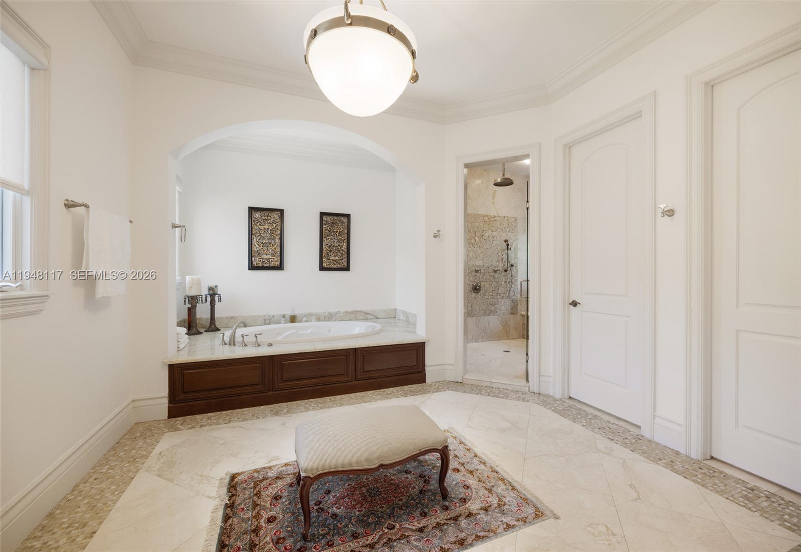 8252 School House Road Miami, FL 33143 - Photo 21 of 43 a view of bathroom with dual sinks