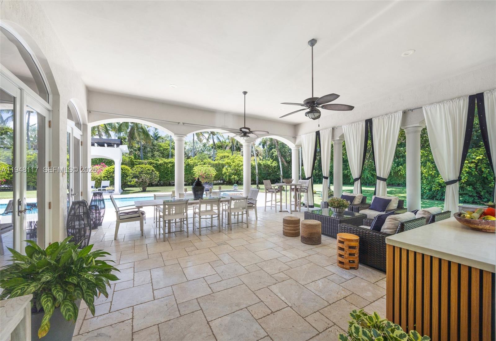 8252 School House Road Miami, FL 33143 - Photo 28 of 43 a view of a dining room with furniture mountain view and garden view
