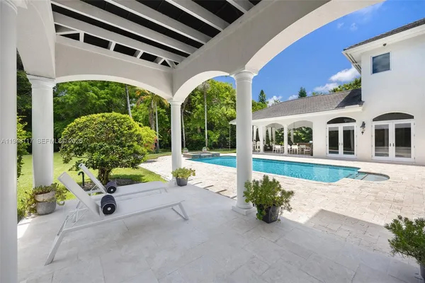 a view of a house with a swimming pool