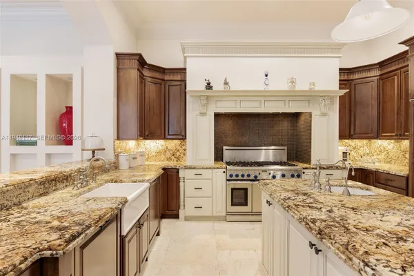 a kitchen with a stove and a sink