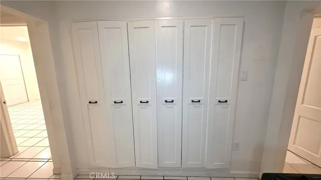 a bathroom with a sink a toilet a mirror and vanity