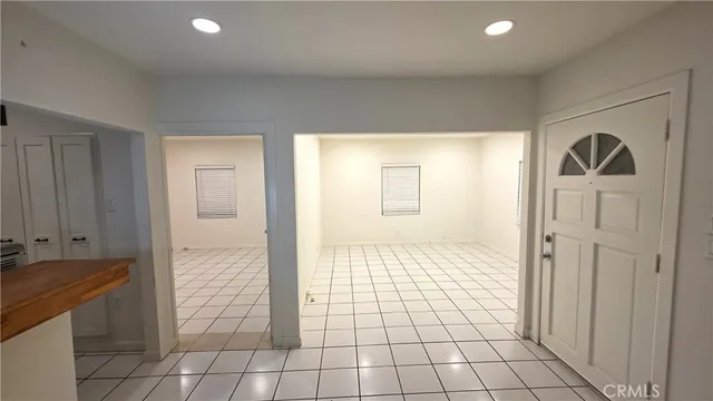 a kitchen with stainless steel appliances a refrigerator and a stove