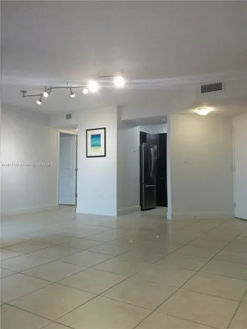 a view of hallway with a large window