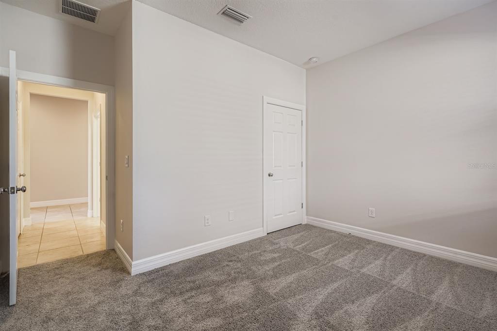 16355 Treasure Point Drive Wimauma, FL 33598 - Photo 25 of 28 a view of an empty room