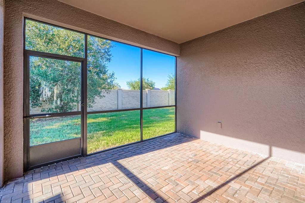 16355 Treasure Point Drive Wimauma, FL 33598 - Photo 28 of 28 a view of an empty room and window