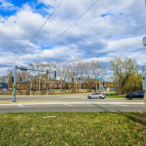 a view of city with tall buildings
