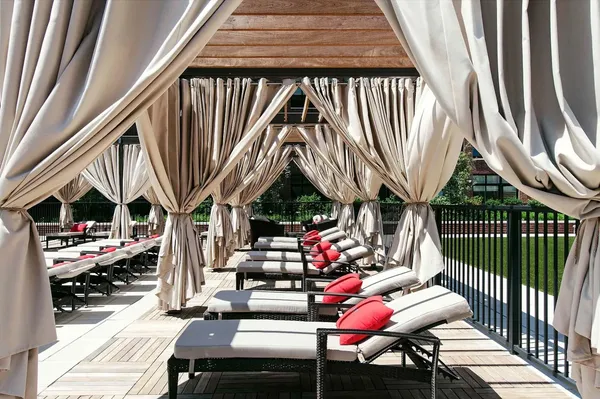 a view of swimming pool with outdoor seating