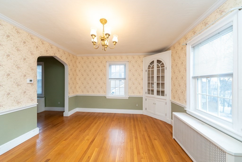 29 Rob Roy Road Worcester, MA 01602 - Photo 7 of 31 wooden floor in an empty room with a window