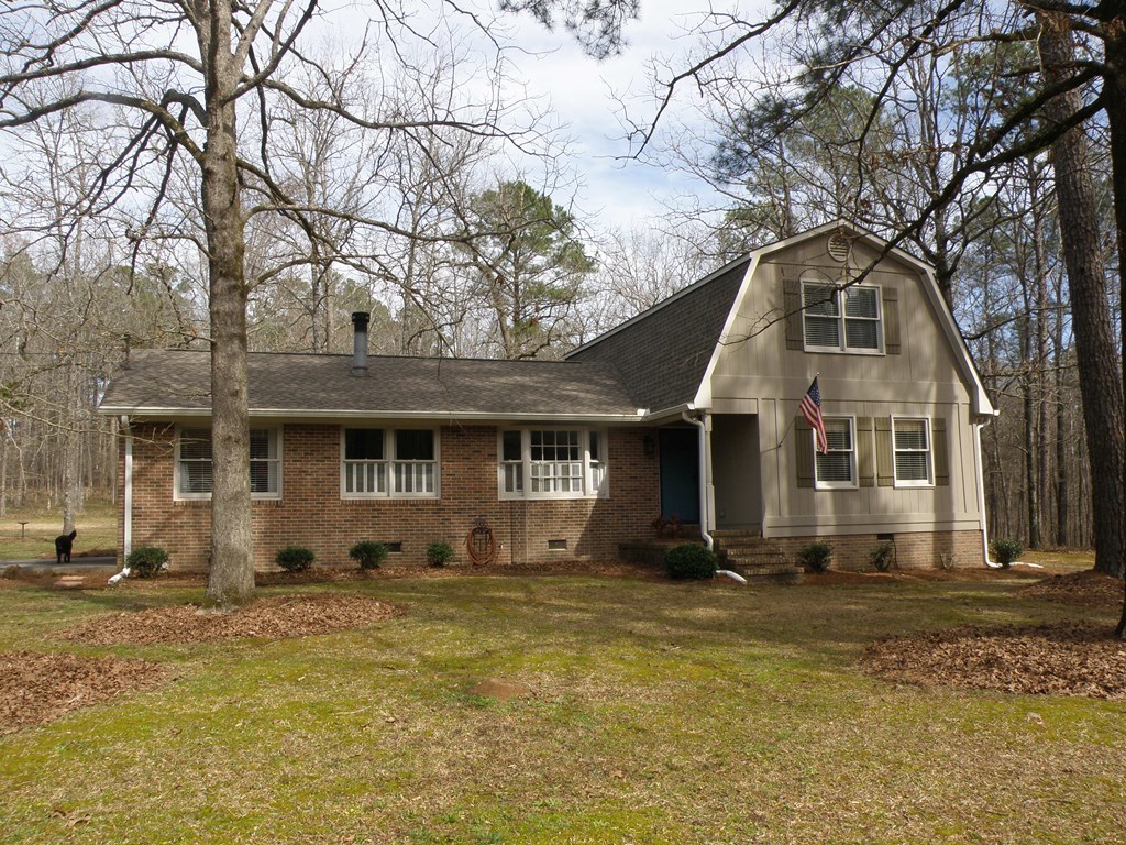 156 Plantation Road Gray, GA 31032 - Photo 3 of 48 a front view of a house with a yard