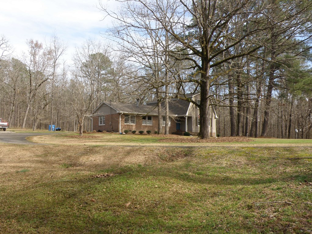 156 Plantation Road Gray, GA 31032 - Photo 4 of 48 a big room with trees