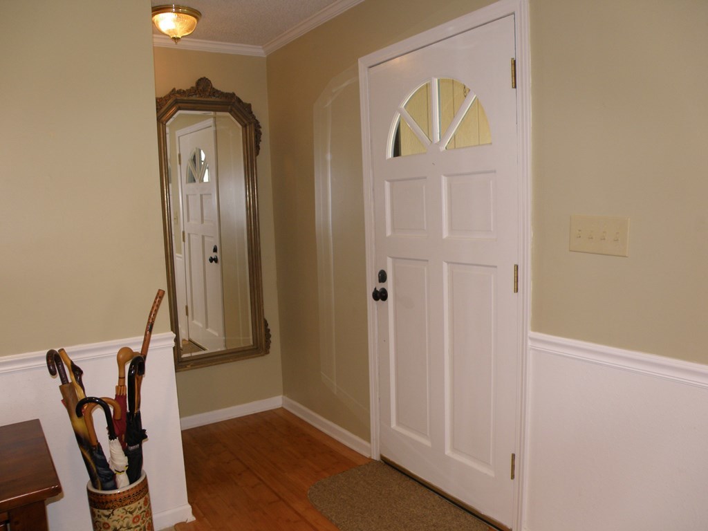 156 Plantation Road Gray, GA 31032 - Photo 5 of 48 a view of an entryway with wooden floor