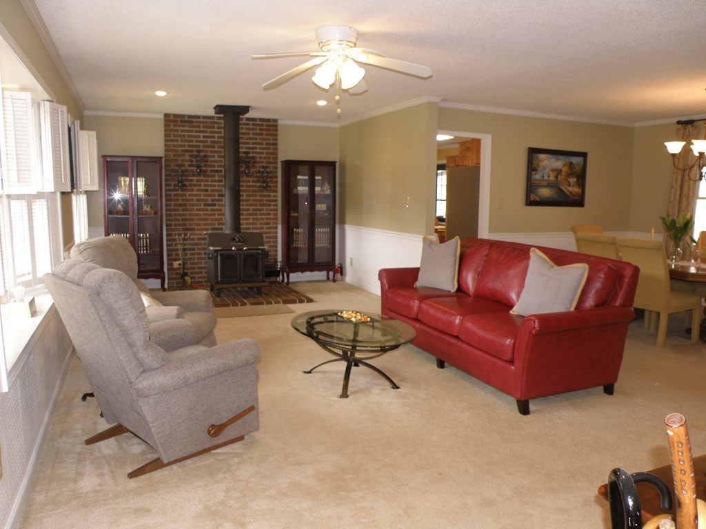156 Plantation Road Gray, GA 31032 - Photo 8 of 48 a living room with furniture and a large window