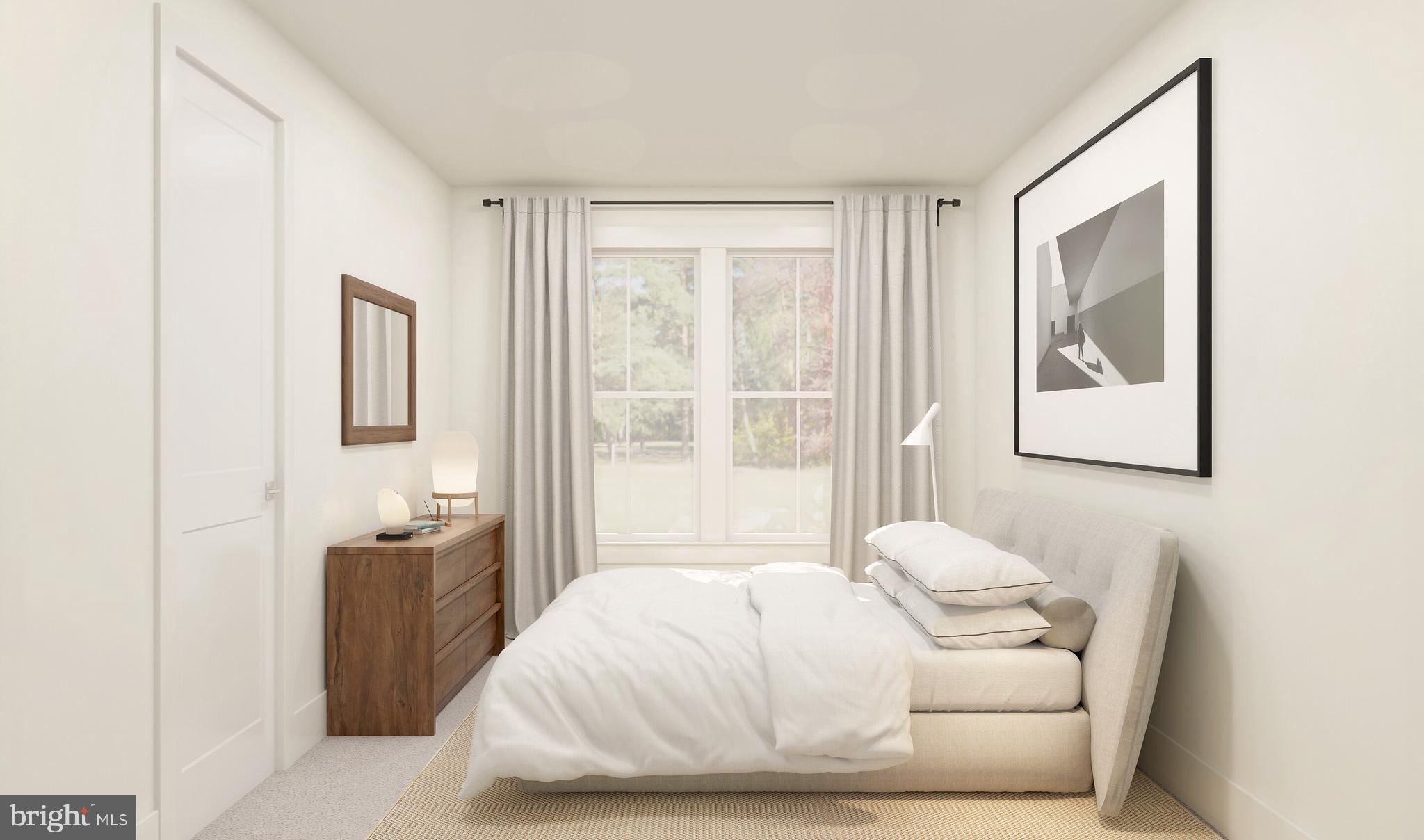 844 Merlin Drive Middletown, DE 19709 - Photo 4 of 17 a bedroom with a bed and wooden floor