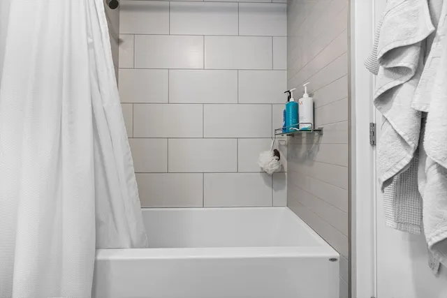 a bathroom with a bathtub