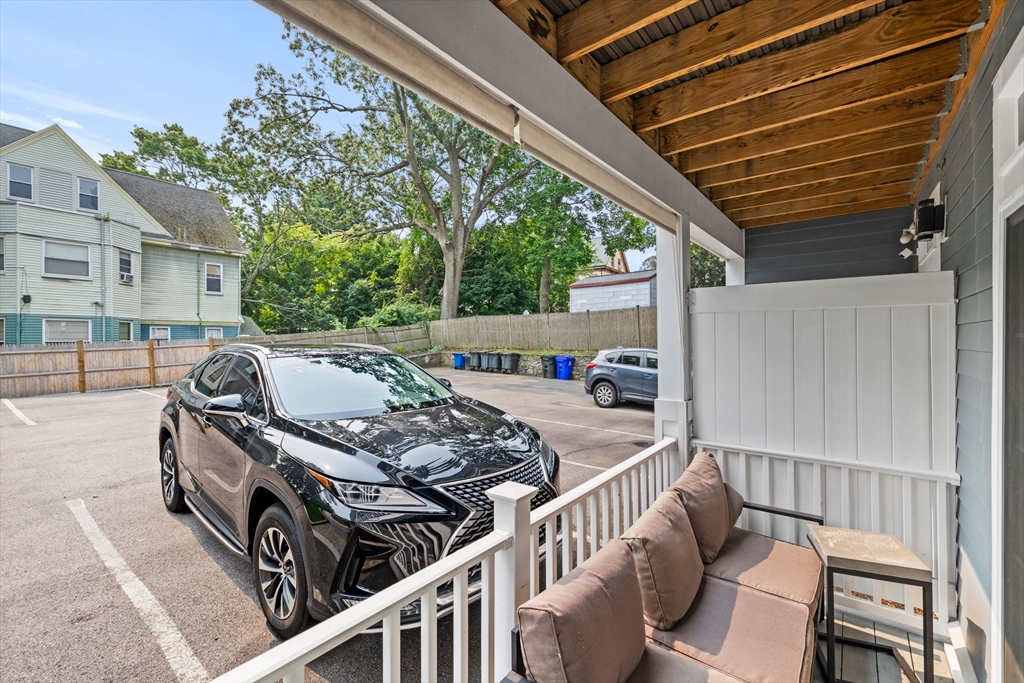 176 Humboldt Avenue, Unit 2 Boston, MA 02121 - Photo 22 of 23 a view of a patio with a table and chairs